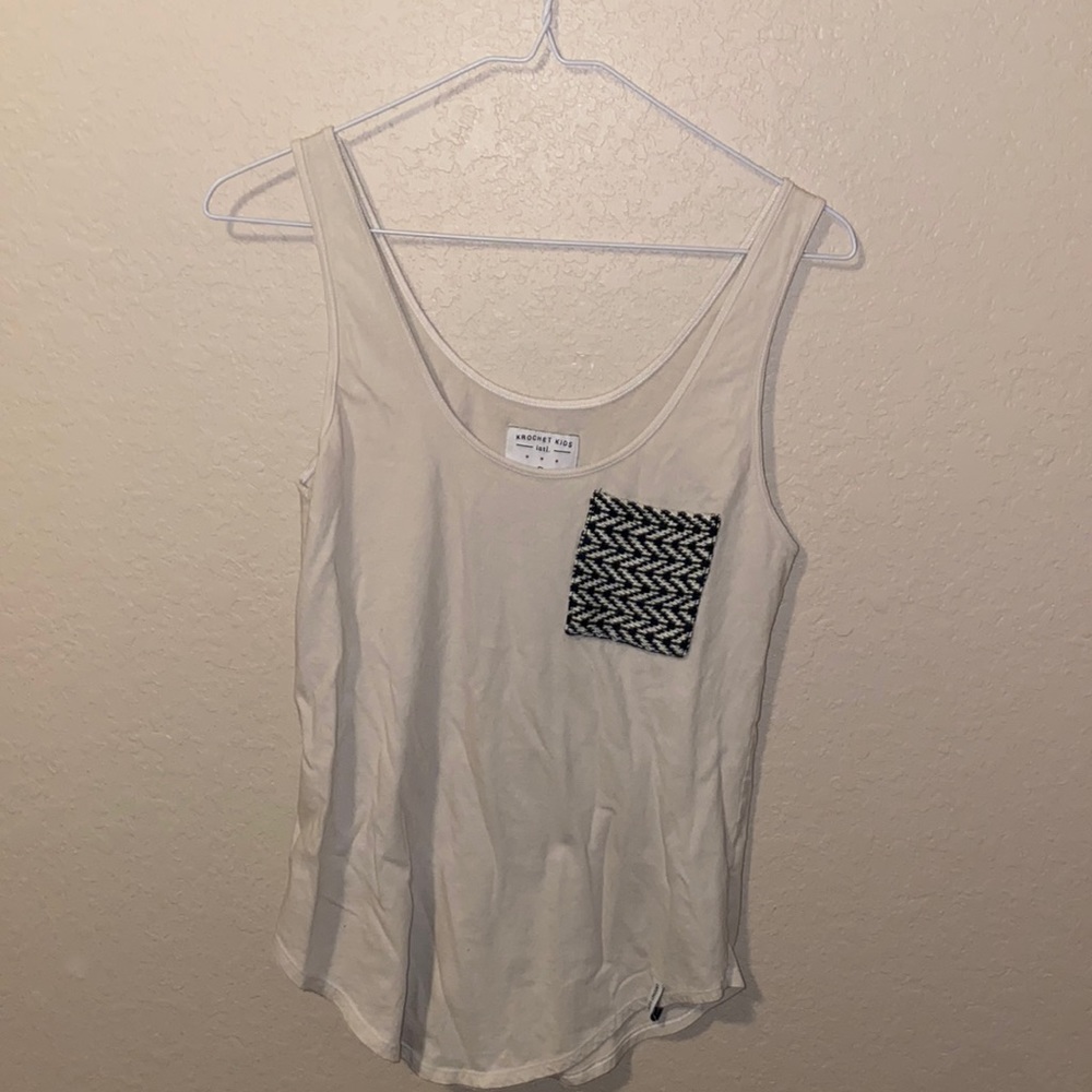 Kroc her Kids into. Tank